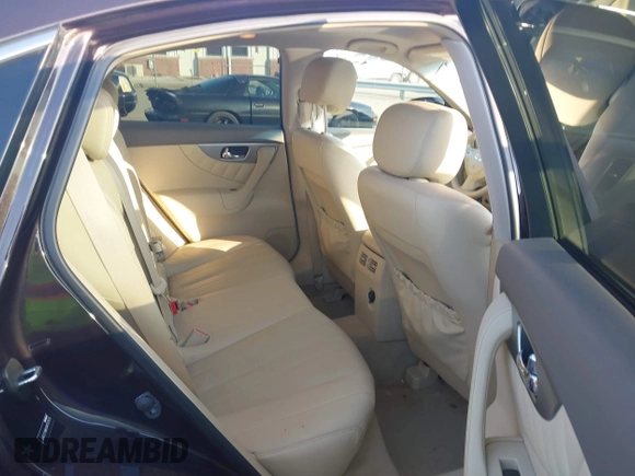 2016 Infiniti QX70 z VIN JN8CS1MW6GM750425, wystawiony jako IAAI lot #42259340 z przebiegiem 79 350 mil mil oraz . Historia ofert i sprzedaży dostępna na DreamBid. Obrazek 8.