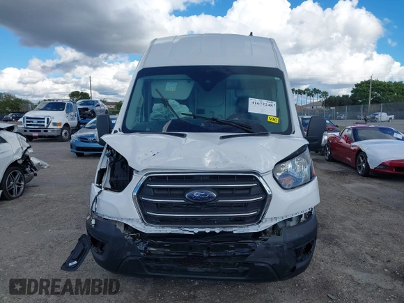 2021 Ford Transit Cargo with VIN 1FTBW3X8XMKA14051, listed as a IAAI auction lot 41672248 with 127,438 mi miles. Bid and sale history available at carsss.com. Image 13.