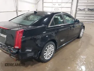 2011 Cadillac CTS z VIN 1G6DC5EY0B0167517, wystawiony jako IAAI lot #41657144 z przebiegiem Nie podano mil oraz . Historia ofert i sprzedaży dostępna na DreamBid. Obrazek 4.