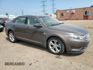 2015 Ford Taurus SEL with VIN 1FAHP2E82FG158662, listed as a Copart auction lot 58233875 with 159,174 mi miles and Salvage title. Bid and sale history available at DreamBid. Image 4.