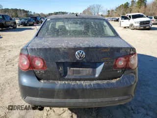 2010 Volkswagen Jetta S with VIN 3VWJX7AJ8AM007693, listed as a Copart auction lot 86056024 with 198,492 mi miles and Salvage title. Bid and sale history available at DreamBid. Image 6.