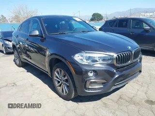 2017 BMW X6 sDrive35i with VIN 5UXKU0C34H0G69291, listed as a IAAI auction lot 41670871 with 73,977 mi miles. Bid and sale history available at carsss.com. Image 1.