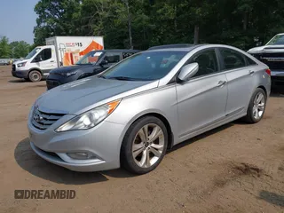 2012 Hyundai Sonata Limited z VIN 5NPEC4AB0CH451960, wystawiony jako IAAI lot #42489513 z przebiegiem 174 310 mil mil oraz . Historia ofert i sprzedaży dostępna na DreamBid. Obrazek 2.