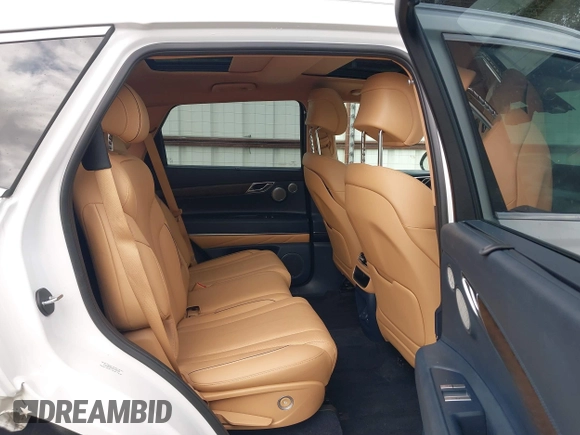2023 Genesis GV80 with VIN KMUHBDSB2PU105268, listed as a IAAI auction lot 40791181 with 21,569 mi miles and . Bid and sale history available at DreamBid. Image 8.