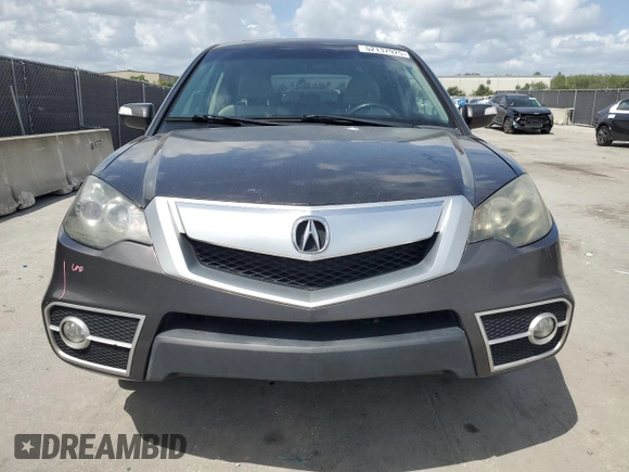 2011 Acura RDX Technology with VIN 5J8TB2H57BA001695, listed as a Copart auction lot 52137925 with 218,562 mi miles and Salvage title. Bid and sale history available at DreamBid. Image 5.