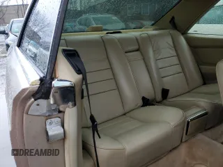 1988 Mercedes-Benz 560 with VIN WDBCA45D9JA411517, listed as a Copart auction lot 46978105 with 298,725 mi miles and Clean Title. Bid and sale history available at DreamBid. Image 10.