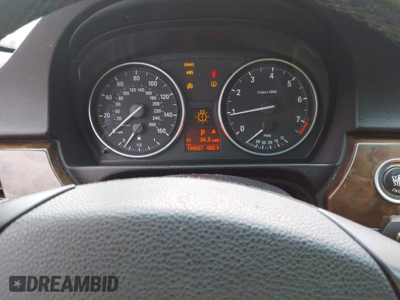 2009 BMW 3 Series 328i with VIN WBAPH775X9NM27054, listed as a IAAI auction lot 42449314 with 169,657 mi miles and . Bid and sale history available at DreamBid. Image 7.