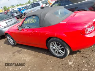 2011 Mazda MX-5 Miata Sport z VIN JM1NC2JF7B0218824, wystawiony jako IAAI lot #42675310 z przebiegiem 137 493 mil mil oraz . Historia ofert i sprzedaży dostępna na DreamBid. Obrazek 14.