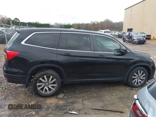 2019 Honda Pilot EX-L z VIN 5FNYF5H56KB016304, wystawiony jako IAAI lot #41072939 z przebiegiem 105 592 mil mil oraz . Historia ofert i sprzedaży dostępna na DreamBid. Obrazek 13.