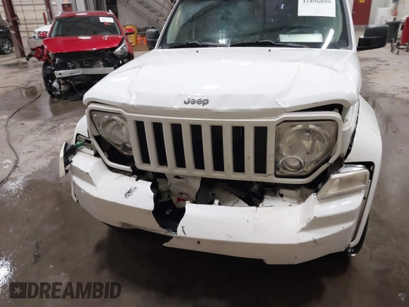 2012 Jeep Liberty Sport with VIN 1C4PJLAK2CW171461, listed as a IAAI auction lot 41896899 with 157,452 mi miles and . Bid and sale history available at carsss.com. Image 6.