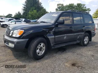 1998 Lexus LX 470 with VIN JT6HT00W4W0021237, listed as a Copart auction lot 65547134 with 286,036 mi miles and Salvage Title. Bid and sale history available at DreamBid. Image 1.