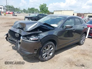 2025 Mazda CX-30 S Preferred with VIN 3MVDMBCM2SM776872, listed as a IAAI auction lot 42582130 with 9,541 mi miles and . Bid and sale history available at DreamBid. Image 2.