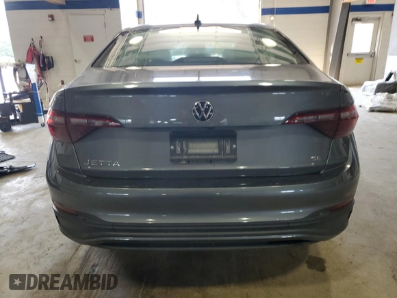 2023 Volkswagen Jetta SE с VIN 3VW7M7BU2PM027555, выставлен на аукционе Copart как лот 56424445 с пробегом 18 692 миль миль и Списание • Salvage title. История ставок и продаж доступна на DreamBid. Изображение 6.