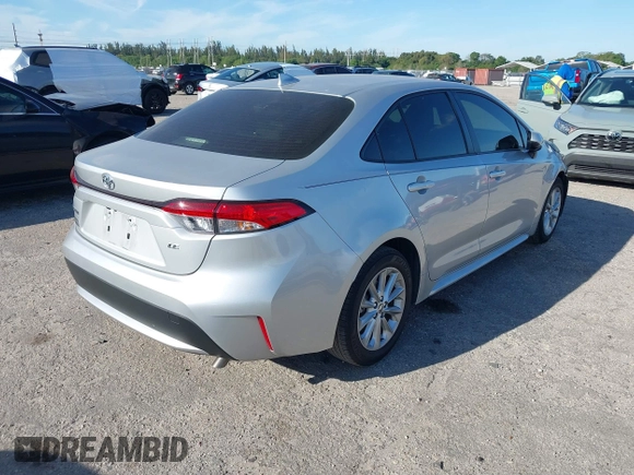 2022 Toyota Corolla LE with VIN JTDVPMAE7N3016592, listed as a IAAI auction lot 41856939 with 28,597 mi miles. Bid and sale history available at carsss.com. Image 4.