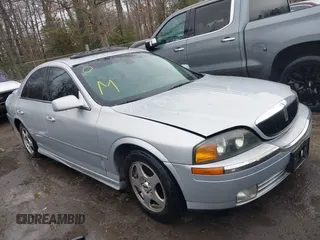 2002 Lincoln LS w/Base Pkg with VIN 1LNHM87A12Y607979, listed as a IAAI auction lot 41523445 with 174,826 mi miles. Bid and sale history available at carsss.com. Image 1.