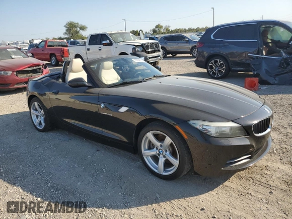 2012 BMW Z4 sDrive28i with VIN WBALL5C5XCE716711, listed as a Copart auction lot 75706534 with 89,948 mi miles and Clean Title. Bid and sale history available at carsss.com. Image 4.