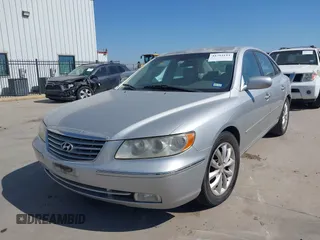 2006 Hyundai Azera SE with VIN KMHFC46FX6A107141, listed as a IAAI auction lot 41793111 with 124,137 mi miles and . Bid and sale history available at DreamBid. Image 2.
