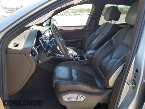 2016 Porsche Macan S with VIN WP1AB2A51GLB42904, listed as a Copart auction lot 52457525 with 67,862 mi miles and Salvage Title. Bid and sale history available at DreamBid. Image 7.