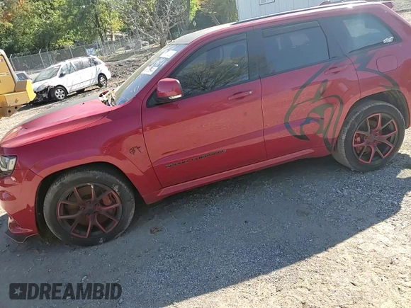 2020 Jeep Grand Cherokee Trackhawk with VIN 1C4RJFN95LC334610, listed as a Copart auction lot 49160944 with 23,348 mi miles and Salvage title. Bid and sale history available at DreamBid. Image 12.