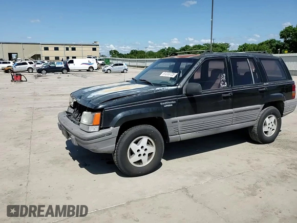 1995 Jeep Grand Cherokee Laredo z VIN 1J4FX58S9SC534442, wystawiony jako Copart lot #61233725 z przebiegiem 363 688 mil mil oraz Szkoda całkowita • Salvage title. Historia ofert i sprzedaży dostępna na DreamBid. Obrazek 14.