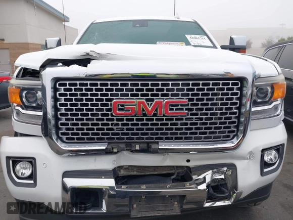 2015 GMC Sierra 2500HD Denali with VIN 1GT120E85FF681680, listed as a IAAI auction lot 42081711 with 67,676 mi miles and . Bid and sale history available at DreamBid. Image 12.
