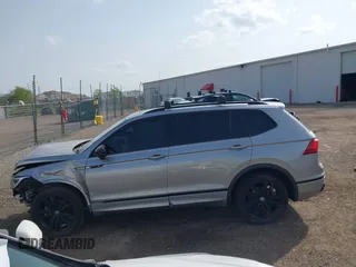 2022 Volkswagen Tiguan SE R-Line Black with VIN 3VV8B7AX7NM030703, listed as a IAAI auction lot 42135974 with 57,116 mi miles and . Bid and sale history available at DreamBid. Image 15.