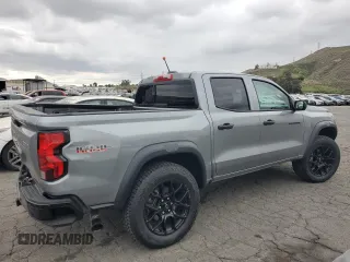 2024 Chevrolet Colorado 4WD Trail Boss with VIN 1GCPTEEK3R1253043, listed as a Copart auction lot 53705385 with 3,706 mi miles and Salvage title. Bid and sale history available at DreamBid. Image 3.