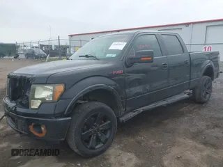 2014 Ford F-150 XL with VIN 1FTFW1ET9EFB11863, listed as a IAAI auction lot 42003611 with 119,961 mi miles and . Bid and sale history available at DreamBid. Image 2.