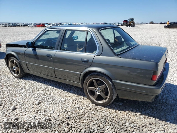 1987 BMW 3 Series 325i with VIN WBAAD2309H2446547, listed as a Copart auction lot 70882344 with 187,806 mi miles and Salvage Title. Bid and sale history available at carsss.com. Image 2.