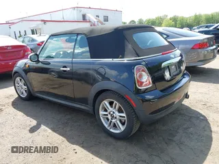 2011 MINI Convertible with VIN WMWZN3C56BT132924, listed as a IAAI auction lot 42161363 with 133,444 mi miles and . Bid and sale history available at DreamBid. Image 3.