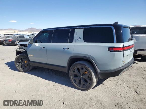 2023 Rivian R1S Adventure z VIN 7PDSGABA1PN021963, wystawiony jako Copart lot #43451105 z przebiegiem 165 mil mil oraz Szkody całkowita. Historia ofert i sprzedaży dostępna na DreamBid. Obrazek 2.