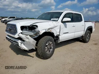 2018 Toyota Tacoma SR z VIN 3TMCZ5AN0JM178886, wystawiony jako Copart lot #56330495 z przebiegiem 71 962 mil mil oraz Szkoda całkowita • Salvage title. Historia ofert i sprzedaży dostępna na DreamBid. Obrazek 1.