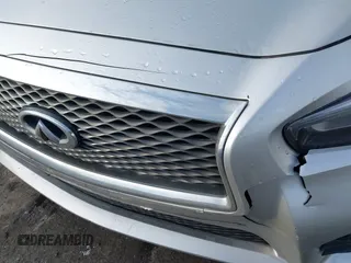 2015 Infiniti Q50 Premium z VIN JN1BV7AR8FM417712, wystawiony jako IAAI lot #41427839 z przebiegiem 88 424 mil mil oraz . Historia ofert i sprzedaży dostępna na DreamBid. Obrazek 6.