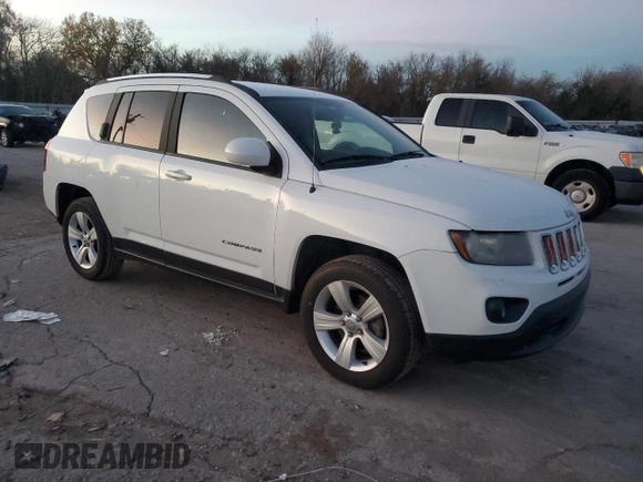 2014 Jeep Compass Latitude with VIN 1C4NJCEB0ED708098, listed as a Copart auction lot 81561334 with 105,687 mi miles and Salvage Title. Bid and sale history available at carsss.com. Image 4.