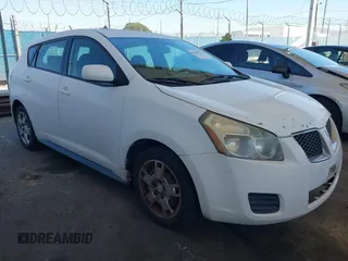 2009 Pontiac Vibe w/1SB with VIN 5Y2SP67089Z477412, listed as a IAAI auction lot 41867327 with 125,769 mi miles. Bid and sale history available at carsss.com. Image 1.