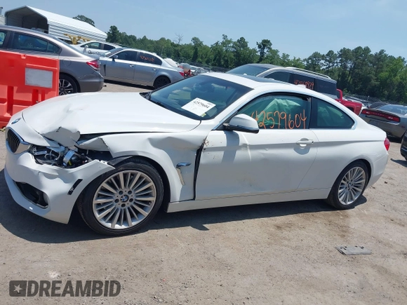 2014 BMW 4 Series 435i with VIN WBA3R1C52EF729201, listed as a IAAI auction lot 42579604 with 145,277 mi miles and . Bid and sale history available at DreamBid. Image 14.
