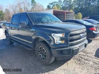 2016 Ford F-150 XLT with VIN 1FTEW1EF2GKE21353, listed as a IAAI auction lot 41209744 with 104,198 mi miles. Bid and sale history available at carsss.com. Image 1.