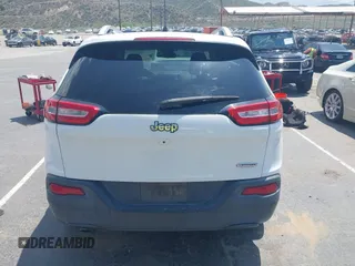 2015 Jeep Cherokee Latitude with VIN 1C4PJLCB7FW790865, listed as a IAAI auction lot 42182034 with 161,642 mi miles and . Bid and sale history available at carsss.com. Image 16.