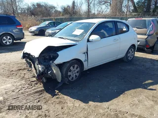 2008 Hyundai Accent GS with VIN KMHCM36C68U055850, listed as a IAAI auction lot 41590651 with 198,827 mi miles. Bid and sale history available at carsss.com. Image 2.