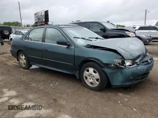 2002 Honda Accord EX z VIN 1HGCG16572A010542, wystawiony jako Copart lot #54746985 z przebiegiem Nie podano mil oraz Szkoda całkowita • Salvage title. Historia ofert i sprzedaży dostępna na DreamBid. Obrazek 4.