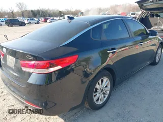 2016 Kia Optima LX with VIN 5XXGT4L36GG105637, listed as a IAAI auction lot 42013800 with 111,836 mi miles. Bid and sale history available at carsss.com. Image 4.