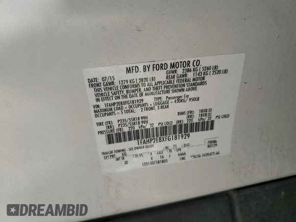 2015 Ford Taurus SEL z VIN 1FAHP2E8XFG181929, wystawiony jako Copart lot #64022325 z przebiegiem 106 272 mil mil oraz Szkoda całkowita • Salvage title. Historia ofert i sprzedaży dostępna na DreamBid. Obrazek 12.