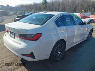 2019 BMW 3 Series 330i xDrive with VIN WBA5R7C54KAJ87250, listed as a IAAI auction lot 40857709 with 81,796 mi miles. Bid and sale history available at carsss.com. Image 4.