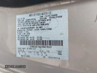 2004 Ford Freestar SE z VIN 2FMZA51664BA73569, wystawiony jako IAAI lot #39712844 z przebiegiem 182 013 mil mil oraz . Historia ofert i sprzedaży dostępna na DreamBid. Obrazek 9.