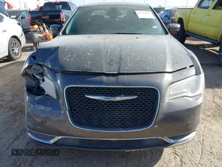 2016 Chrysler 300 Anniversary Edition with VIN 2C3CCAAG0GH206645, listed as a IAAI auction lot 41739990 with 154,516 mi miles and . Bid and sale history available at DreamBid. Image 12.