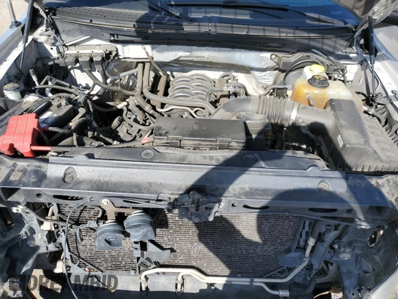 2014 Ford F-150 XL with VIN 1FTFW1EF5EKE57295, listed as a Copart auction lot 61687195 with 123,852 mi miles and Salvage title. Bid and sale history available at DreamBid. Image 11.