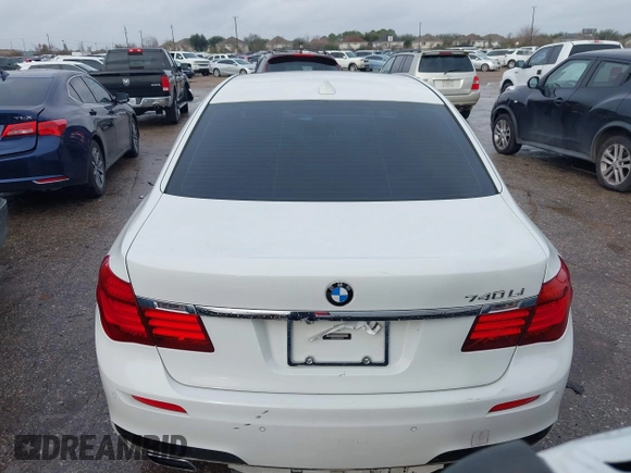 2015 BMW 7 Series 740Li with VIN WBAYE4C54FD947205, listed as a IAAI auction lot 41566291 with 172,729 mi miles and . Bid and sale history available at DreamBid. Image 16.