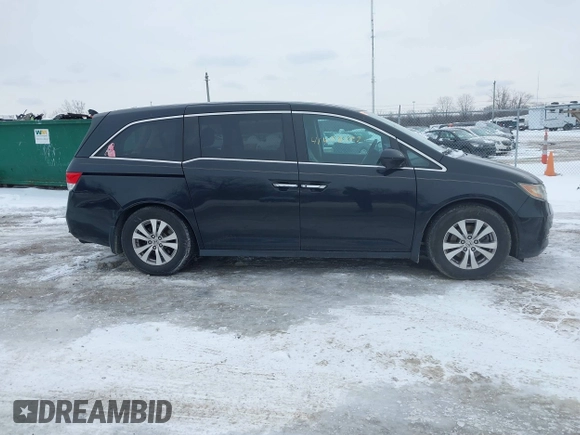 2015 Honda Odyssey EX-L with VIN 5FNRL5H60FB018030, listed as a IAAI auction lot 41608357 with 166,214 mi miles and . Bid and sale history available at carsss.com. Image 13.