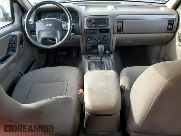 2003 Jeep Grand Cherokee Laredo with VIN 1J4GX48S83C536747, listed as a Copart auction lot 84250534 with 162,649 mi miles and Salvage Title. Bid and sale history available at carsss.com. Image 8.