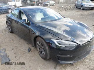 2022 Tesla Model S with VIN 5YJSA1E54NF476793, listed as a IAAI auction lot 41204340 with 27,382 mi miles and . Bid and sale history available at DreamBid. Image 1.